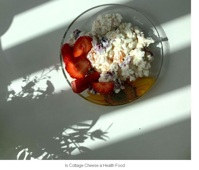 High-protein cottage cheese bowl topped with fresh strawberries.